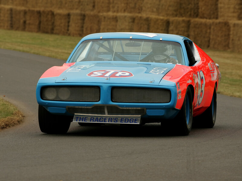 Blue and red race car on track