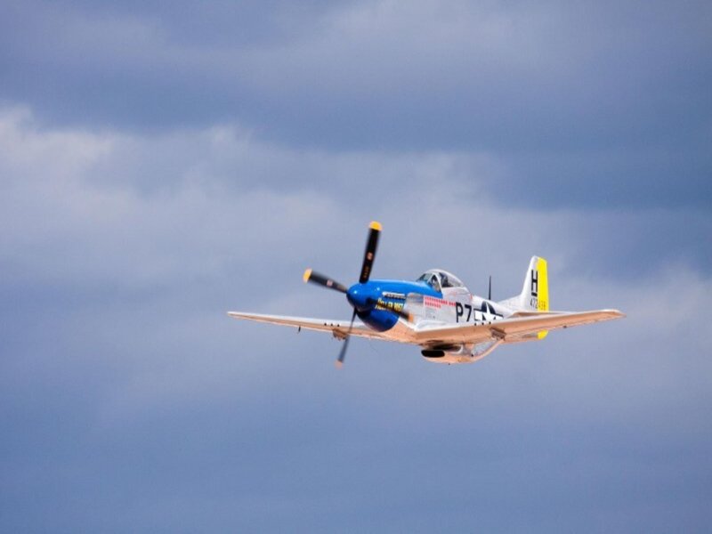 Blue and Silver Airplane — Dramatic