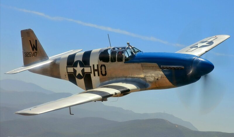Blue and Silver Airplane — Dynamic, Afternoon, Photograph, Mountains