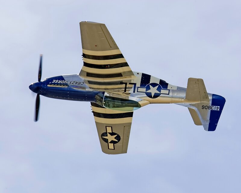 Blue and Silver Airplane — Dynamic, Afternoon, Photograph