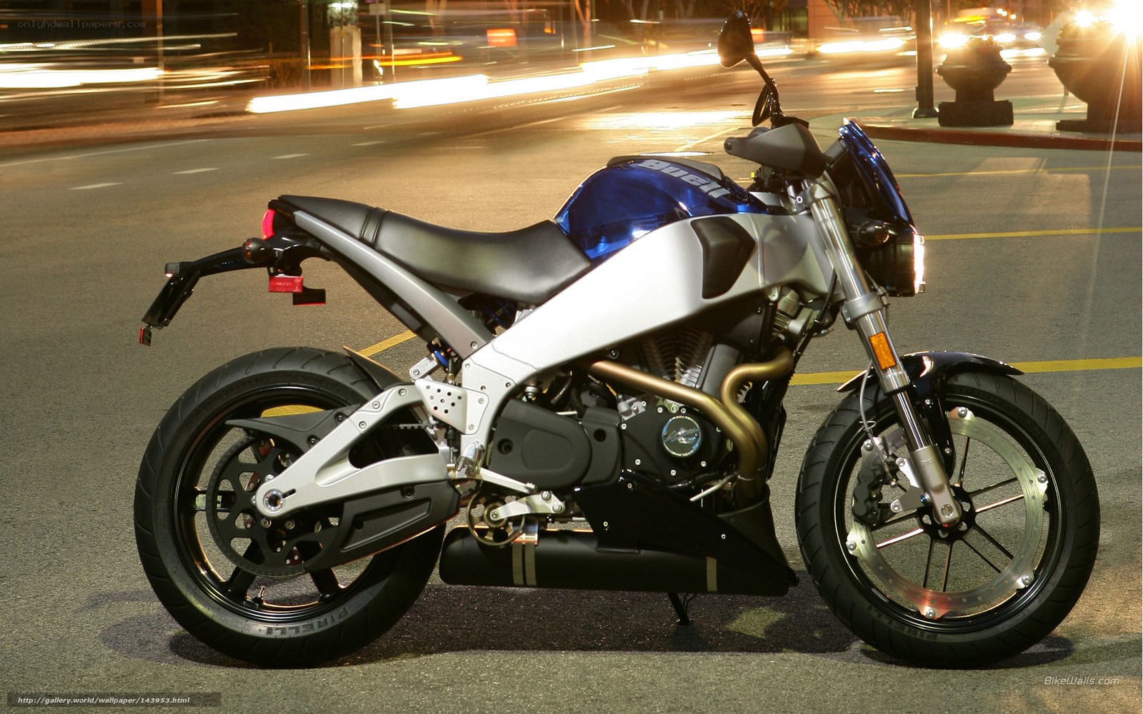 Blue and silver motorcycle at night