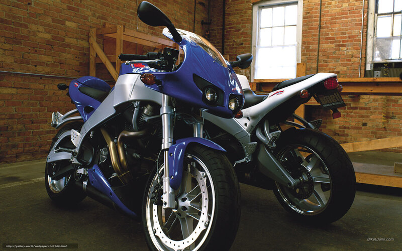 Blue and silver motorcycles in garage