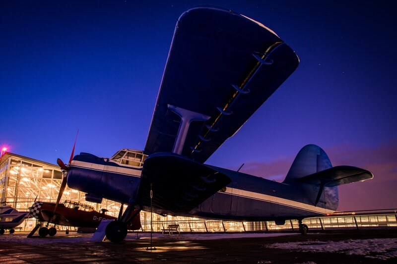 Blue and White Airplane — Dramatic