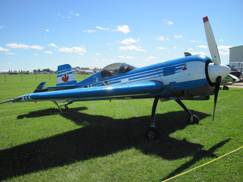 Blue and White Airplane — Serene, Afternoon
