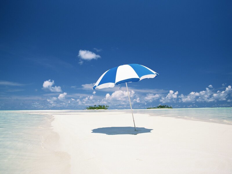 Blue and white beach umbrella