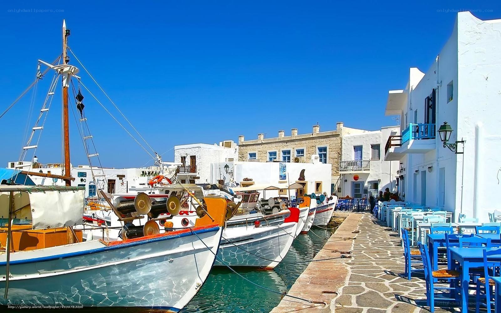 Blue and white boats in a Greek harbor