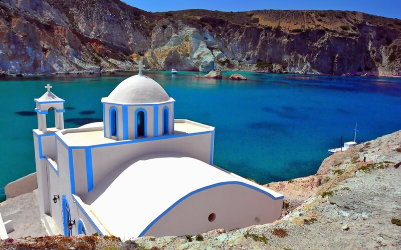 Blue and white church by the sea