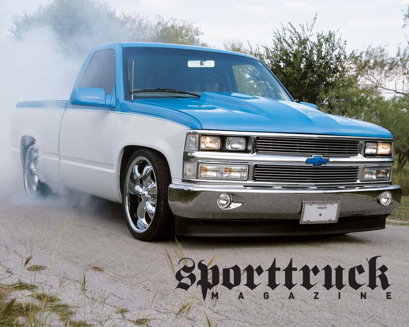 Blue and white custom pickup truck