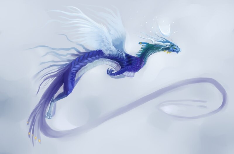 blue and white dragon in flight
