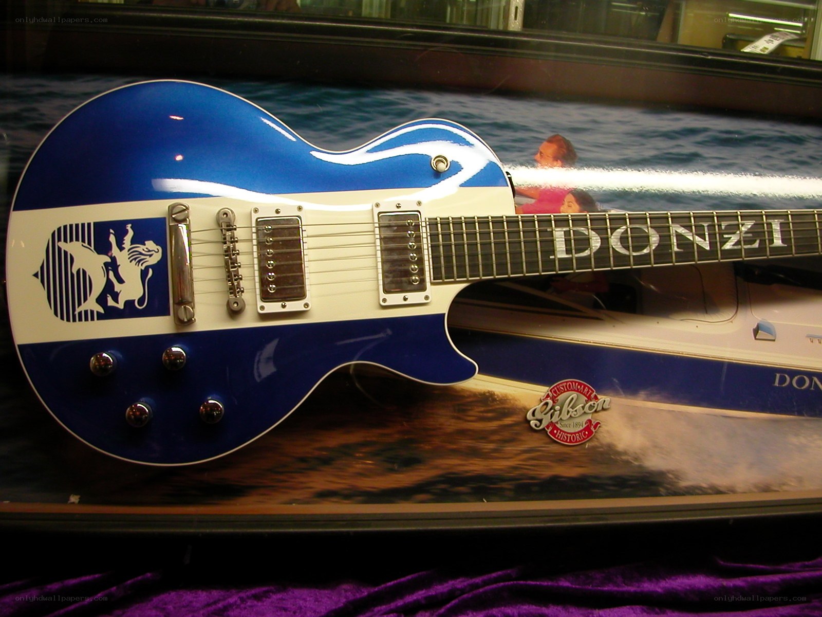 blue and white electric guitar