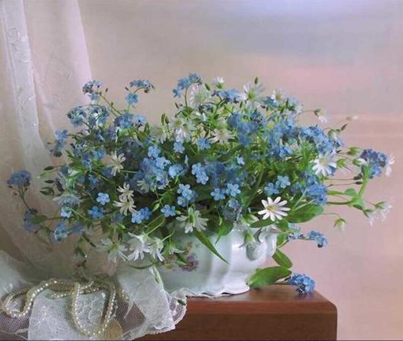 Blue and white flowers in a vase