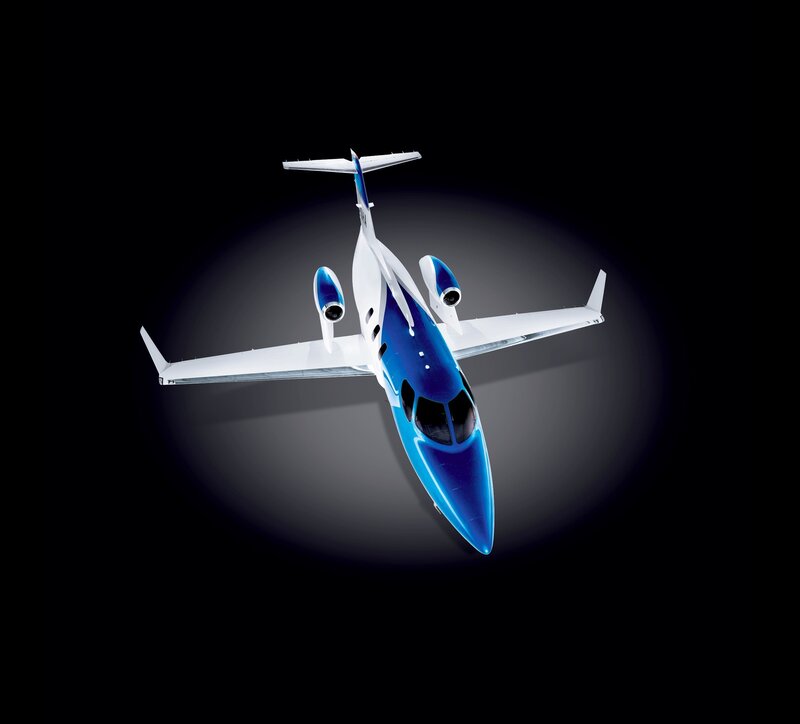 Blue and White Jet Aircraft — Dramatic
