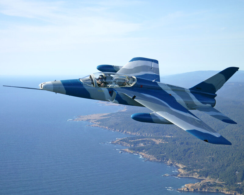 Blue and White Jet Aircraft — Serene