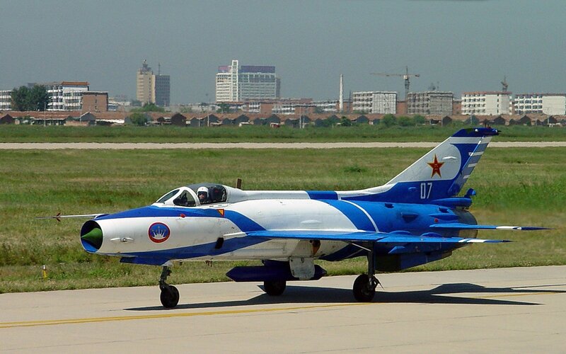Blue and White Jet Fighter — Calm