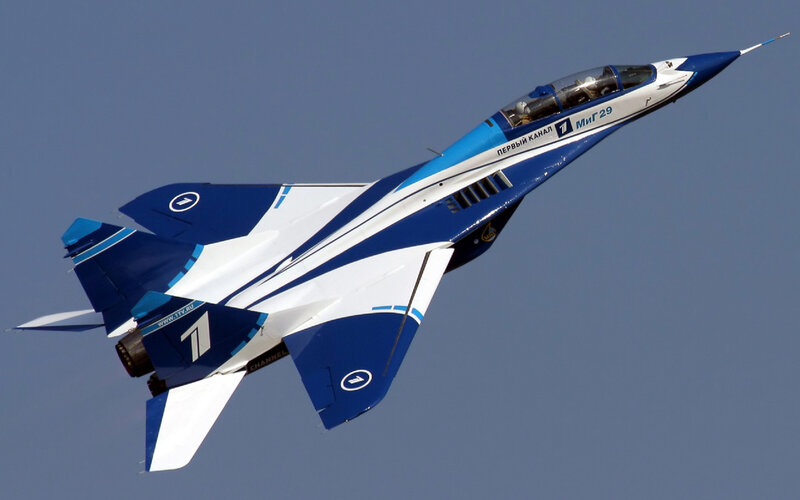 Blue and White Jet Fighter — Dynamic, Photograph