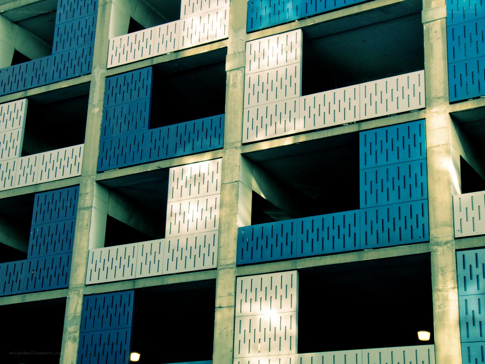 blue and white parking garage facade