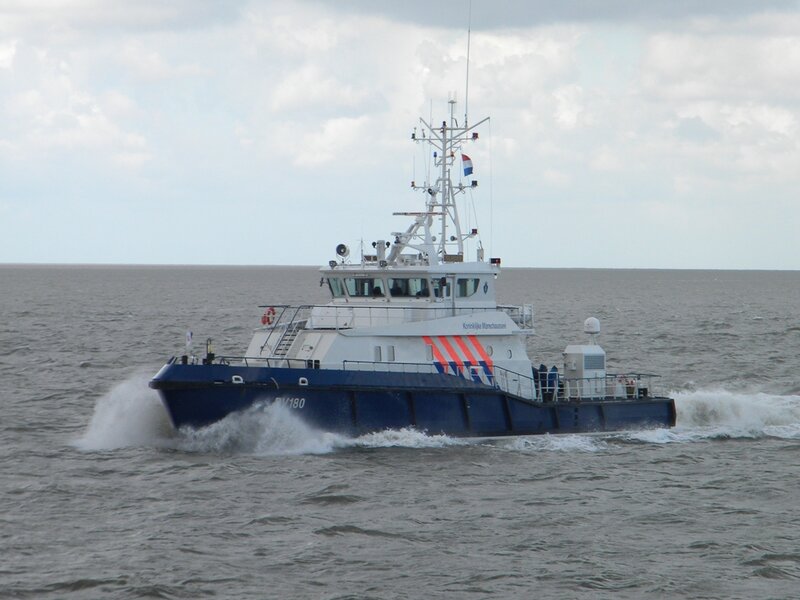 Blue and White Patrol Boat — Calm
