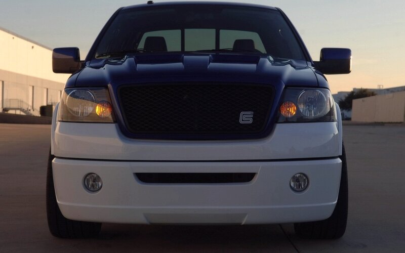 blue and white pickup truck
