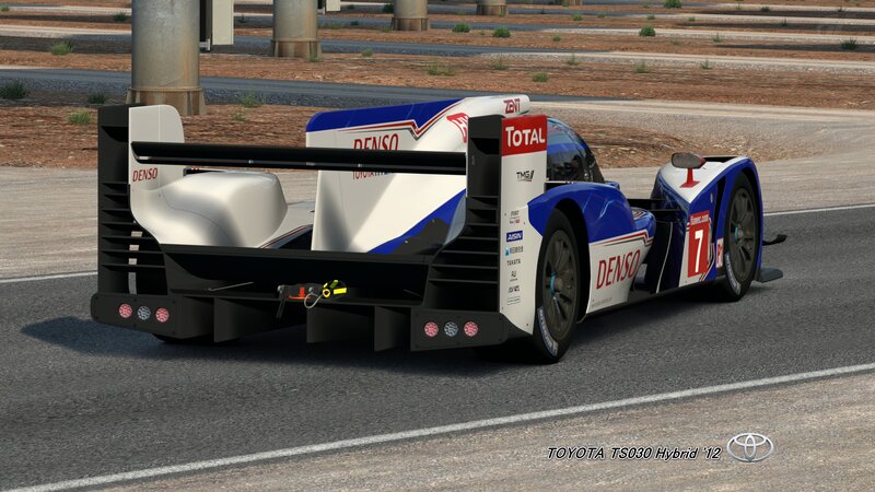 Blue and White Race Car — Competitive