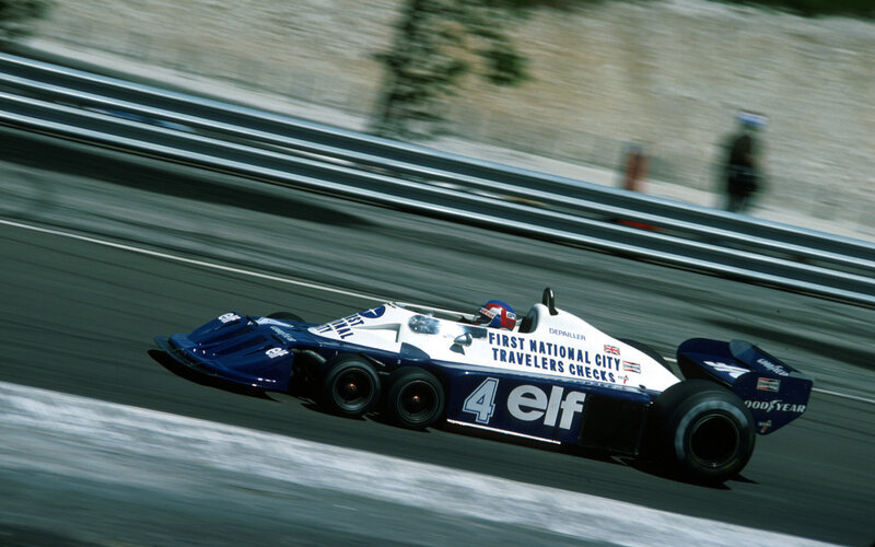 Blue and White Race Car — Dynamic, Afternoon, Photograph, Driver, Track, Guardrail
