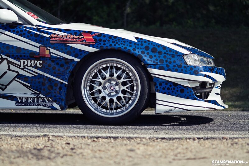 Blue and White Race Car — Dynamic, Afternoon, Photograph, Wheel