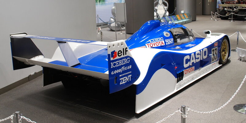 Blue and white race car on display