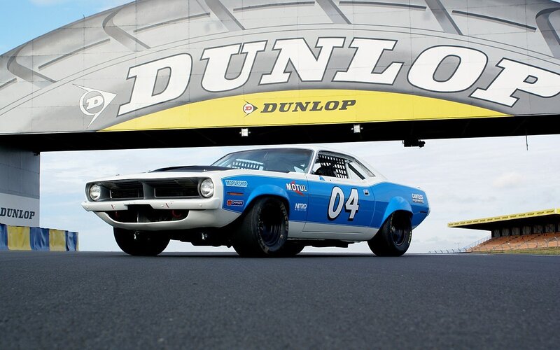 Blue and white race car on track