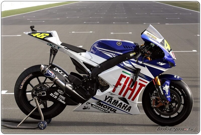 Blue and White Racing Motorcycle — Calm
