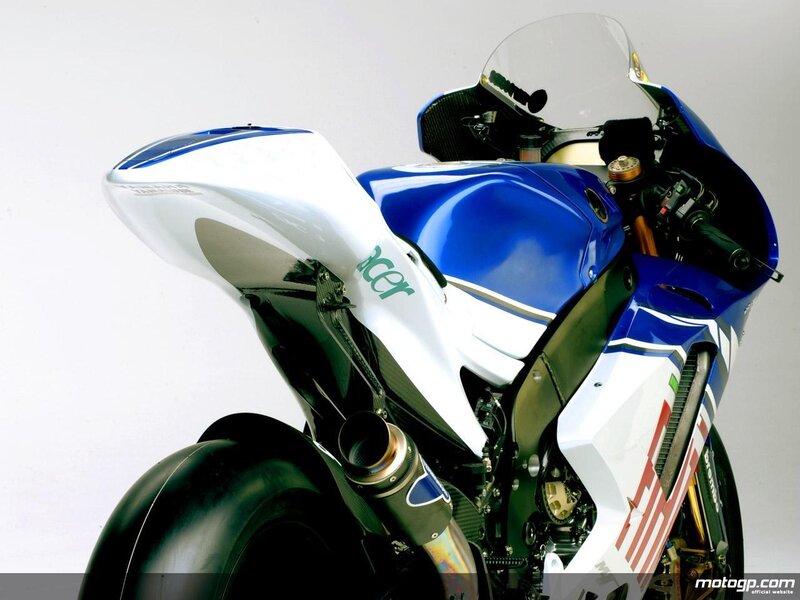 blue and white racing motorcycle