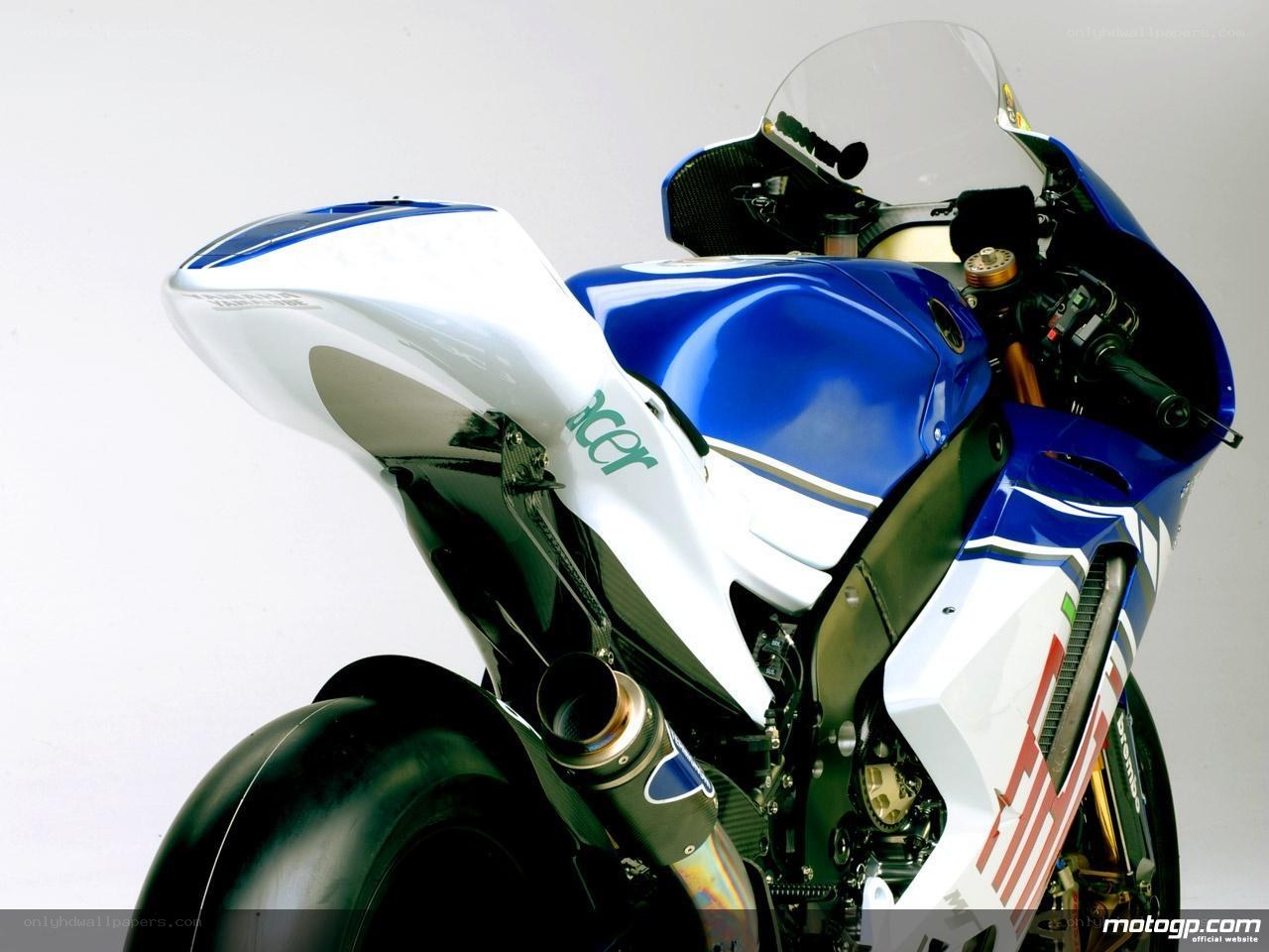 blue and white racing motorcycle