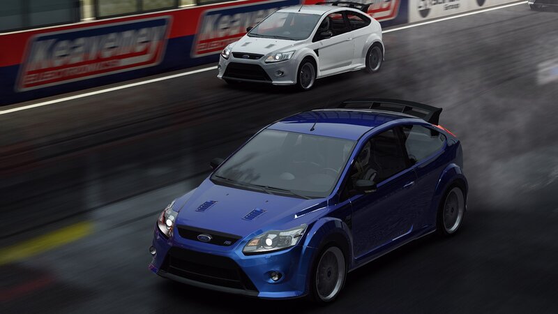 Blue and white rally cars racing