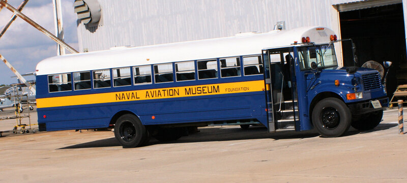 Blue and white school bus