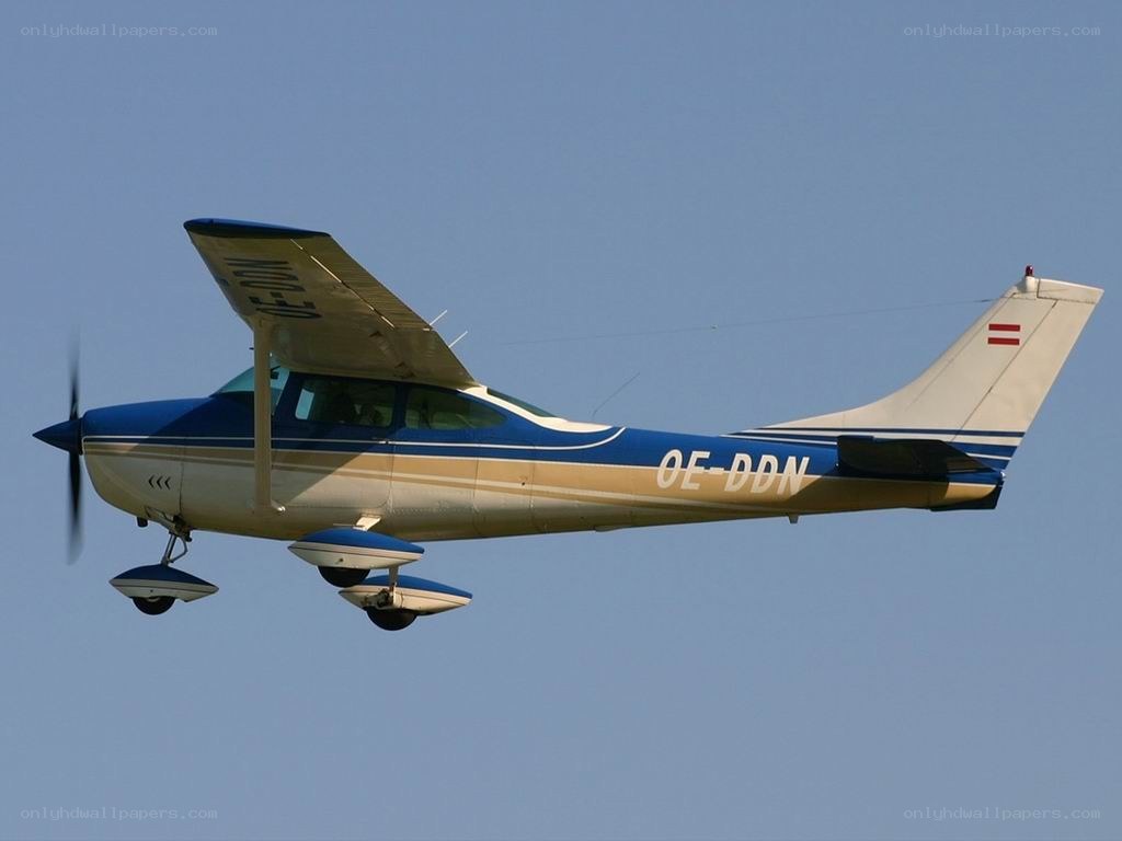 Blue and white single-engine airplane