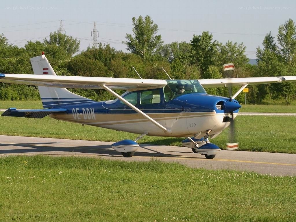 Blue and white single-engine plane