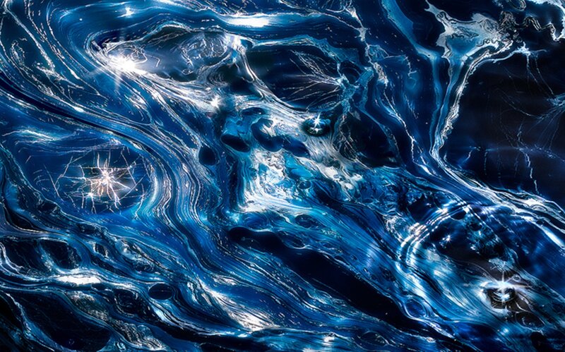 Blue and White Swirling Liquid
