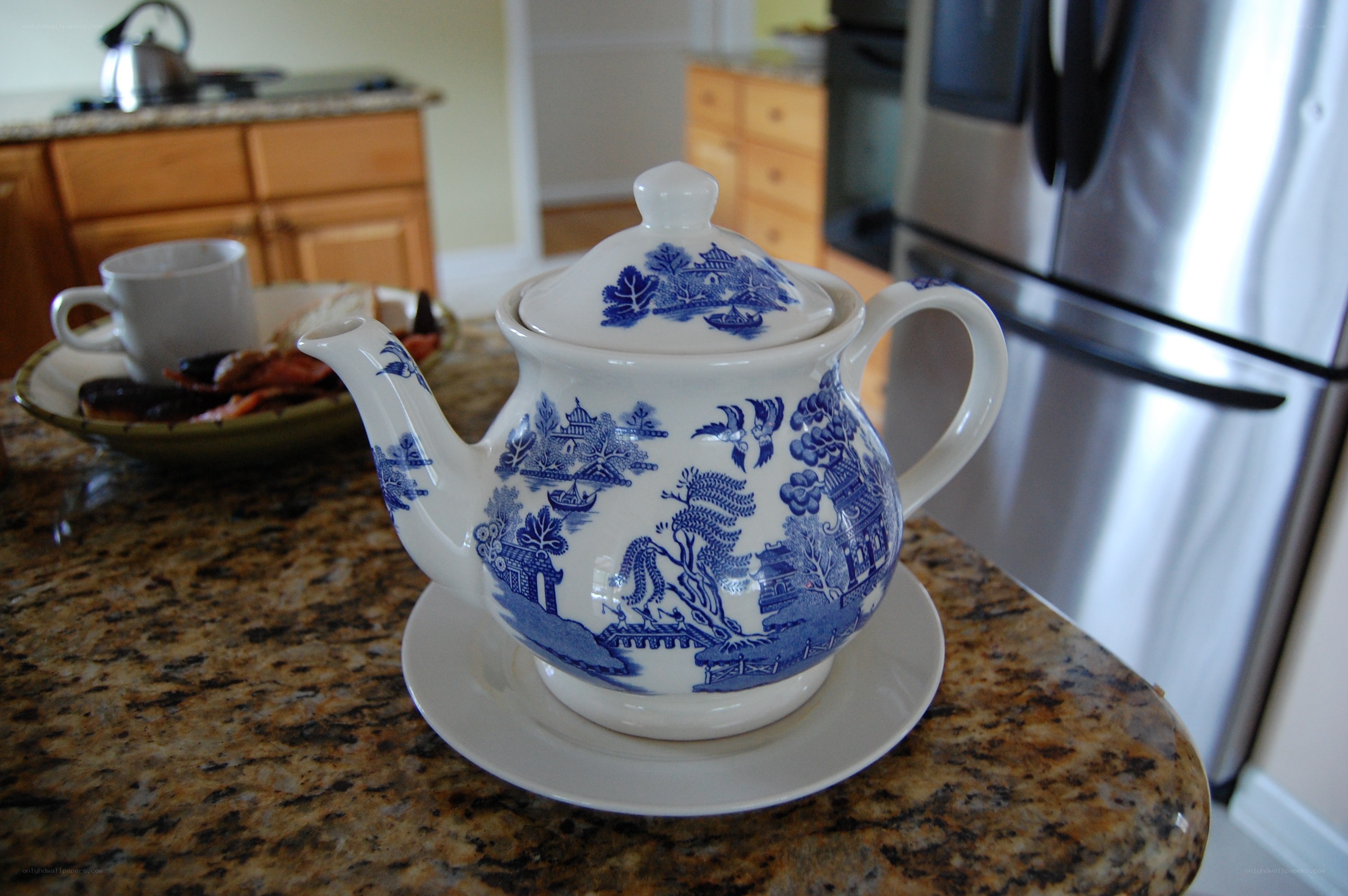 Blue and white teapot on counter