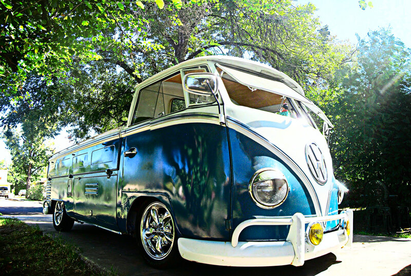 blue and white volkswagen bus