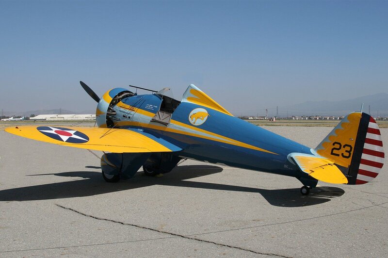 Blue and Yellow Airplane — Calm, Afternoon