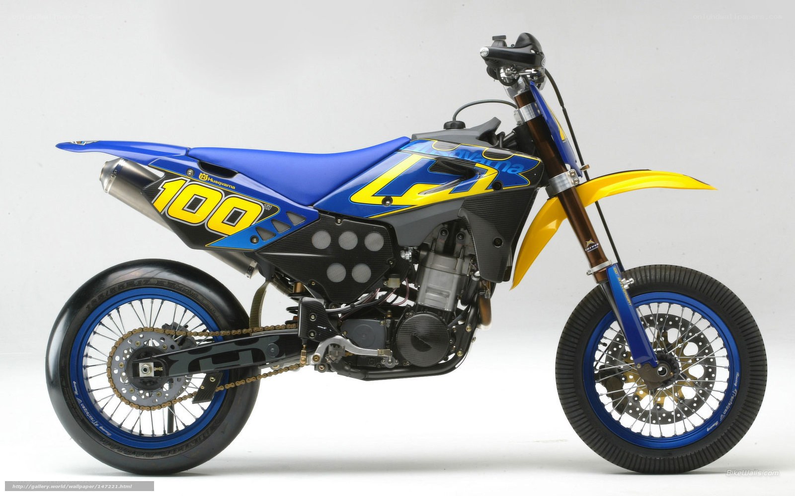 blue and yellow dirt bike
