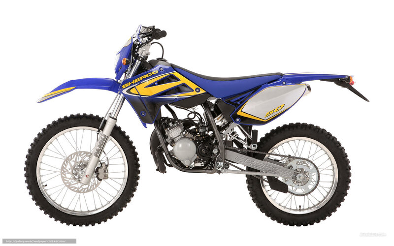 blue and yellow dirt bike