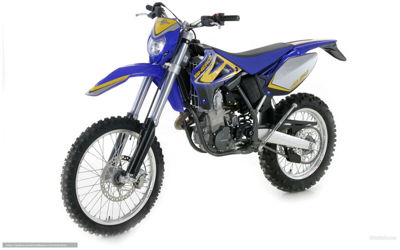 blue and yellow dirt bike