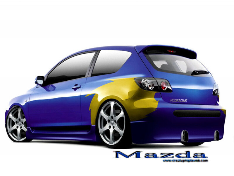 blue and yellow mazda hatchback