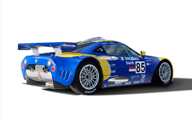 Blue and Yellow Race Car — Dynamic, Photograph, Race Car, Wings