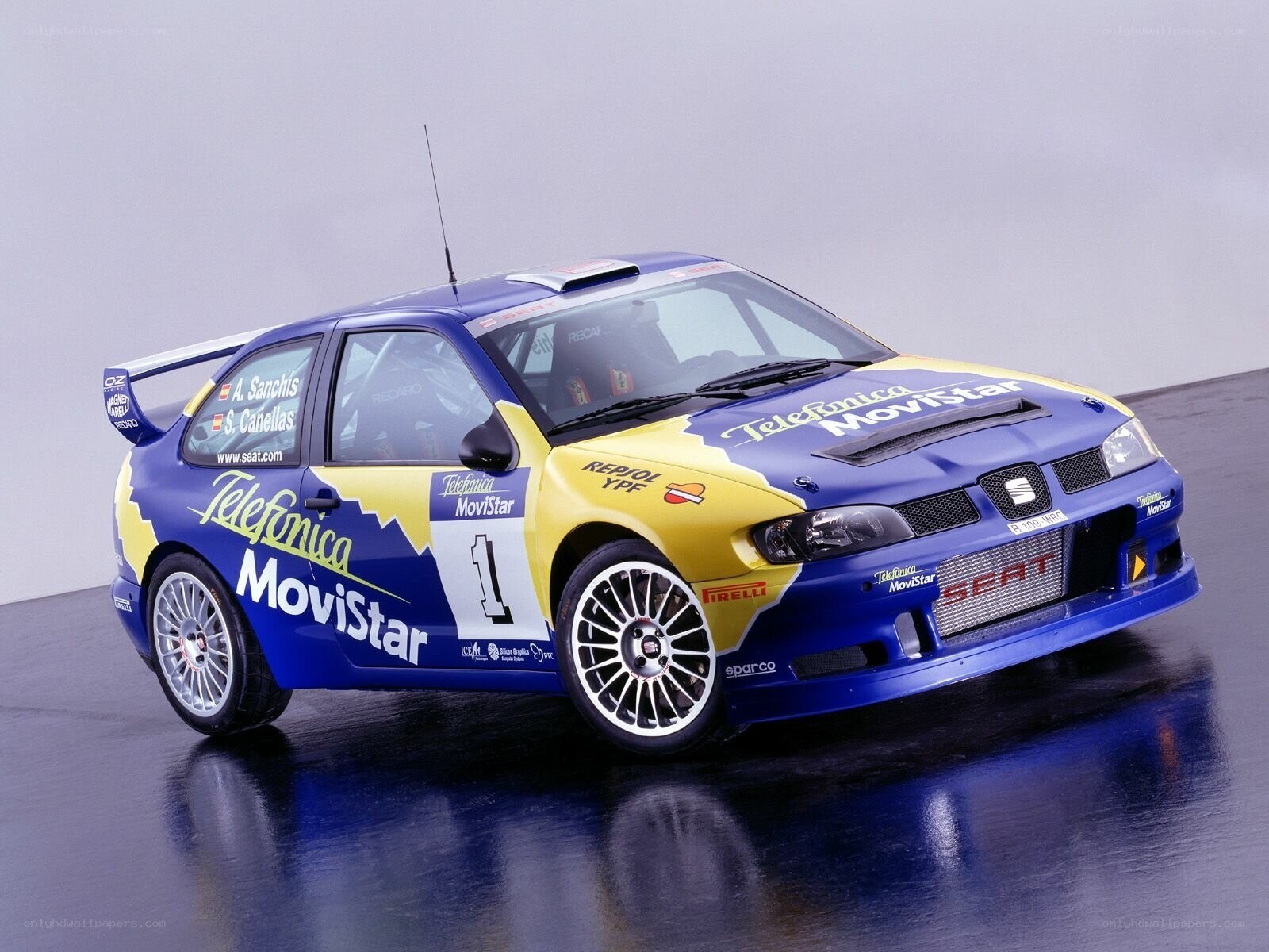 blue and yellow rally car
