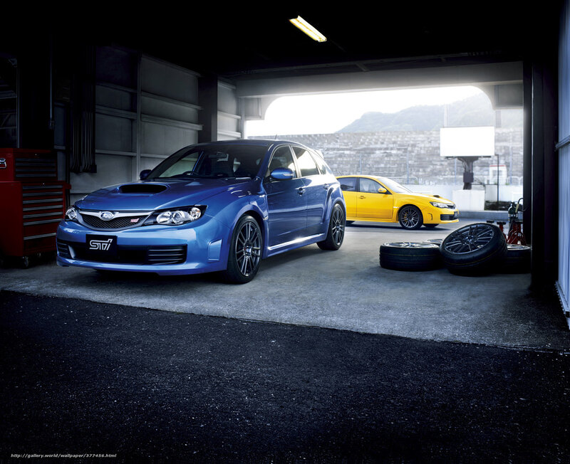 Blue and yellow Subaru STI cars