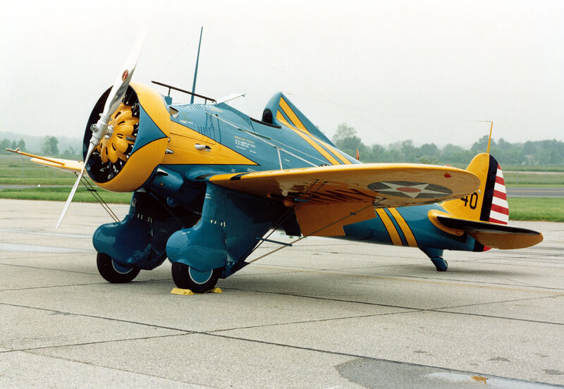 blue and yellow vintage airplane