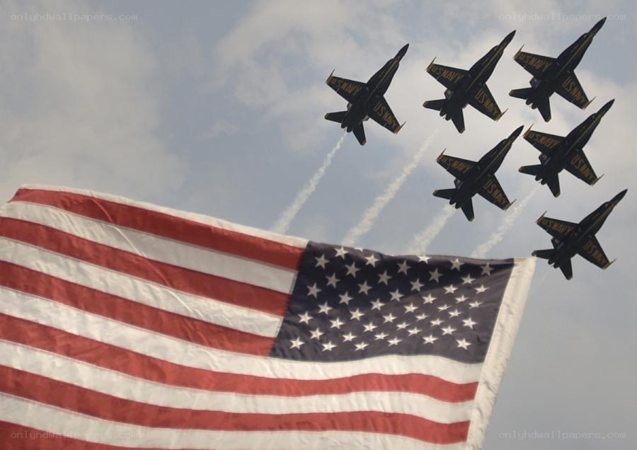 Blue Angels fly over American flag