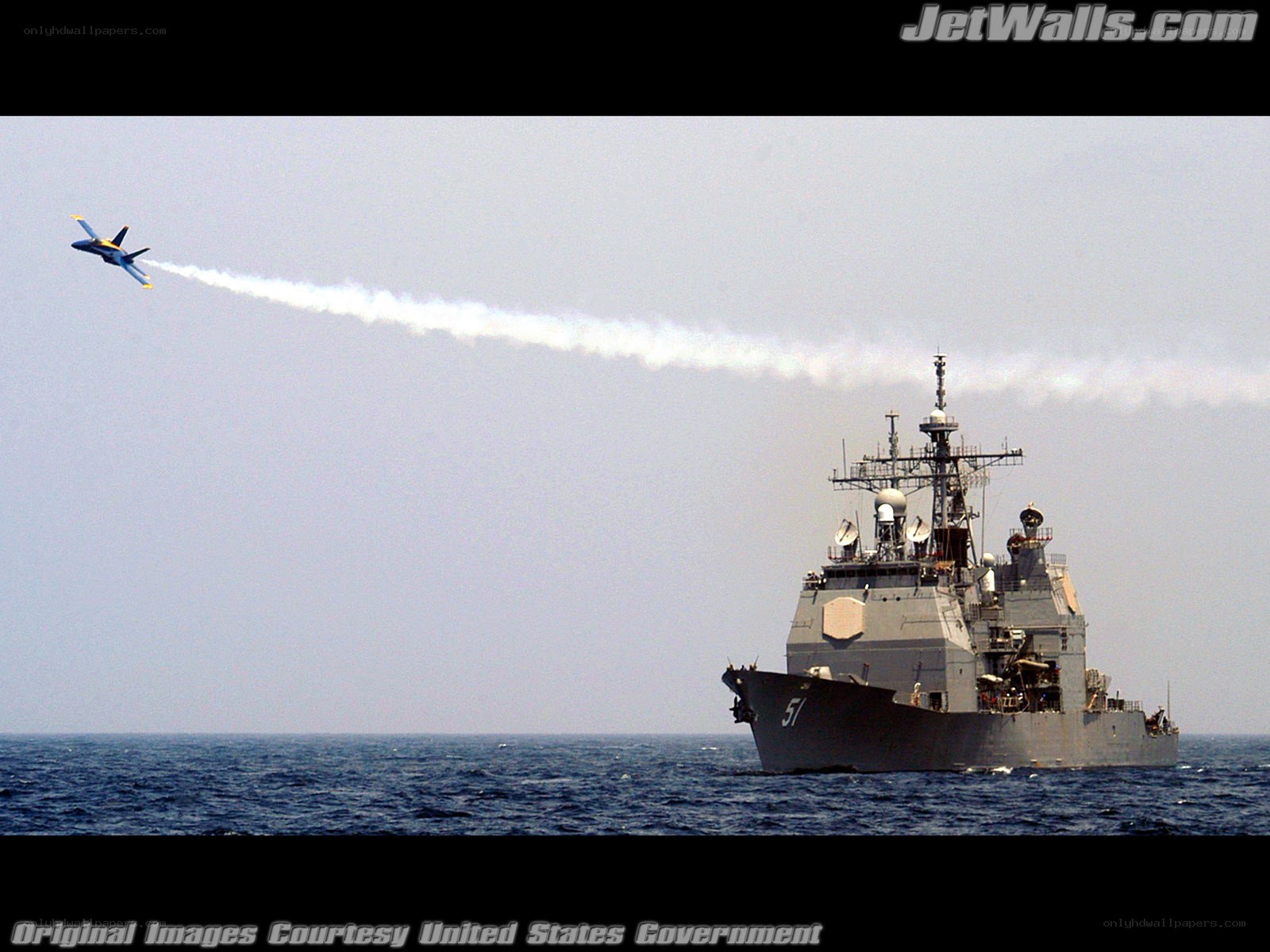 Blue Angels fly over warship