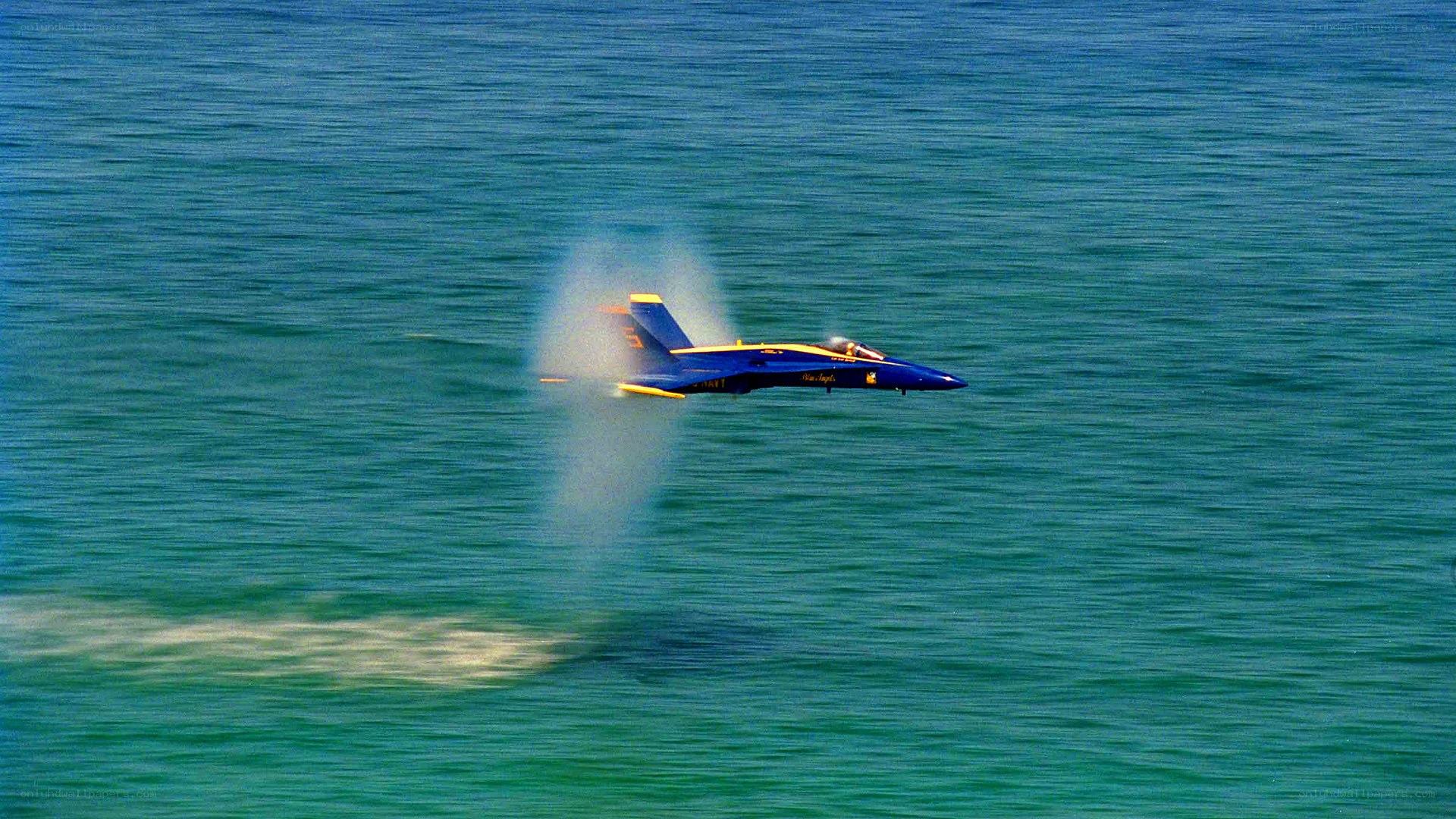 Blue Angels jet over water