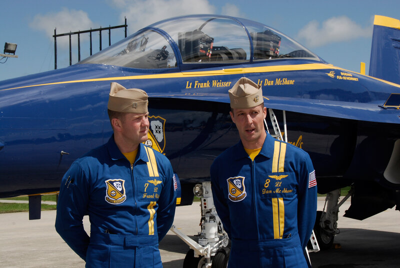 Blue Angels pilots in front of jet